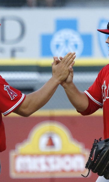 Pujols, Trout power Angels past ChiSox 8-4 in opener